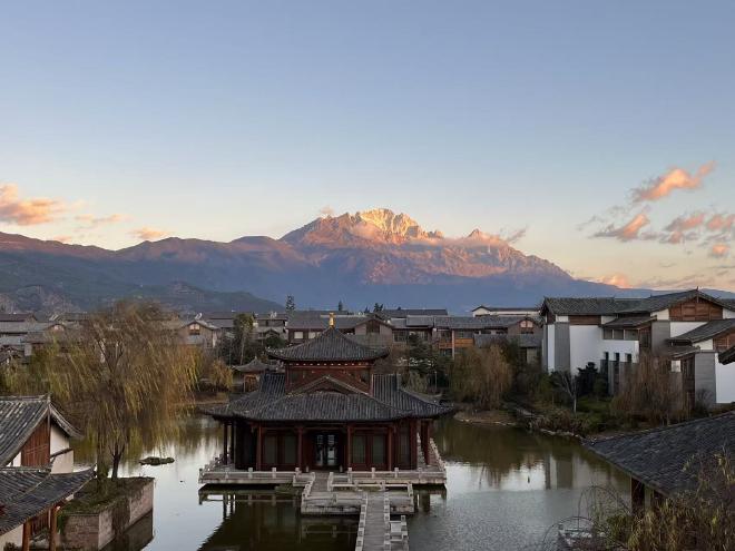 Sunlight filtering through trees on a mountain trail